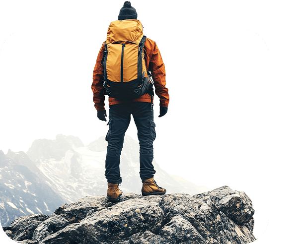 Backpacker On Mountain Peak