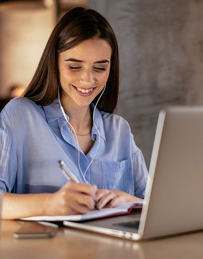 Online Learning Student Taking Notes